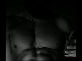 Yuri Buny plays with a puppy mask